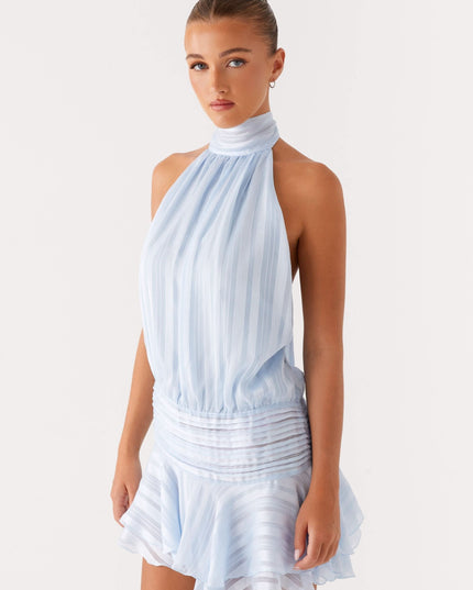 Light blue pleated halter mini dress with high neckline and gathered waist