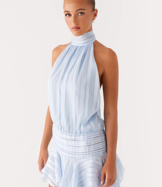Light blue pleated halter mini dress with high neckline and gathered waist