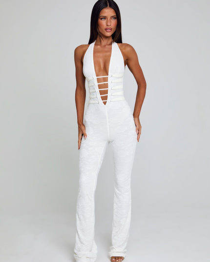 White halter mesh jumpsuit with strappy front and flared wide-leg fit