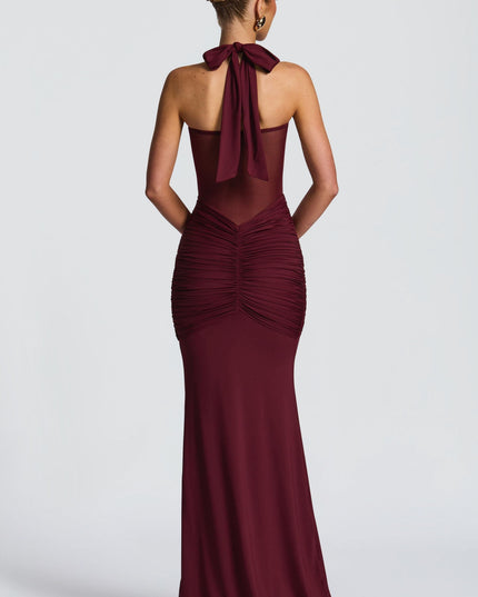 Burgundy halter maxi dress back view with tied neckline and ruched details
