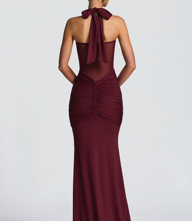 Burgundy halter maxi dress back view with tied neckline and ruched details