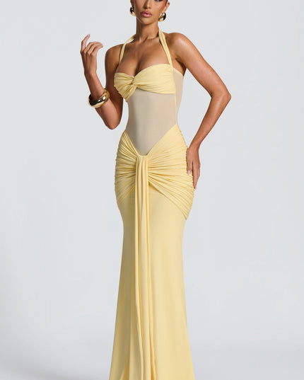 Yellow maxi dress with halter neckline and ruched hip detail