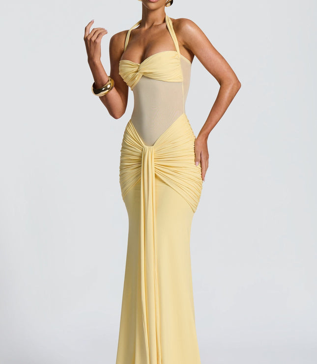Yellow maxi dress with halter neckline and ruched hip detail