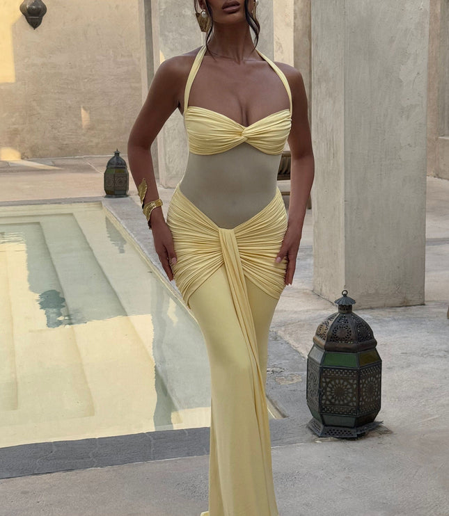 Yellow halter maxi sundress with ruched details poolside