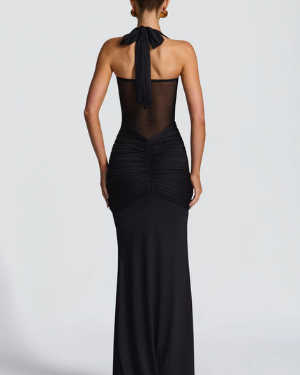 Back view black halter maxi dress with tied halter strap detail