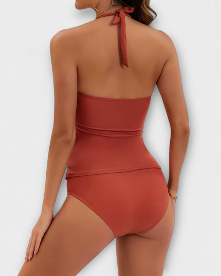 Back view of red halter bikini with tie closure and gold accents