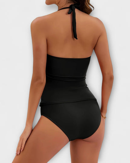 Back view of black halter swimsuit with tied neck strap