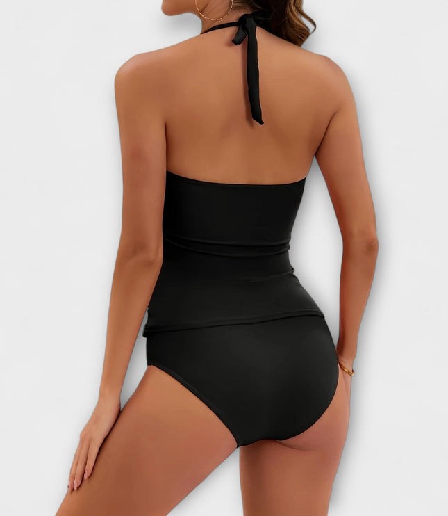 Back view of black halter swimsuit with tied neck strap