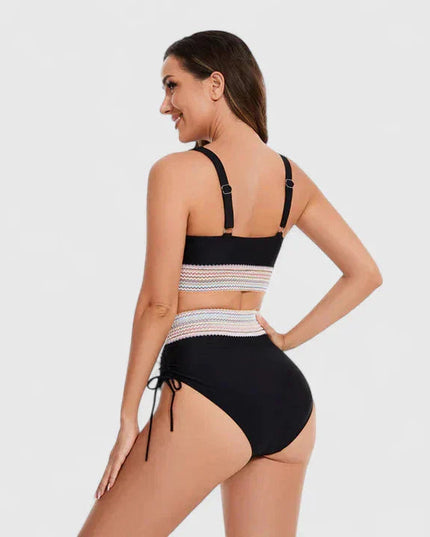 Black halter bikini back view showing strappy halter neck and striped band