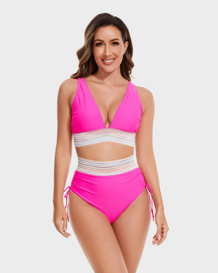 pink halter bikini with multicolor striped waistband and high-waisted bottoms