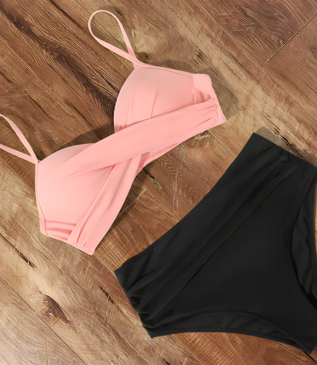 Pink and black wrap bikini set with ruched high-waisted bottom flat lay