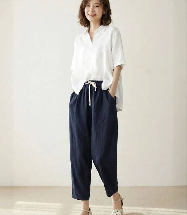 Navy linen drawstring pants with white button-up shirt, casual style