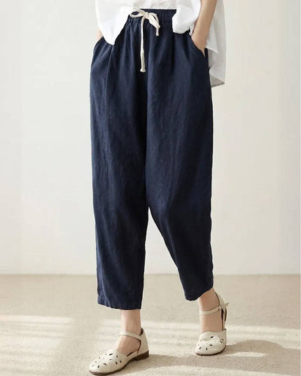 Navy linen drawstring pants with white oversized shirt, full outfit