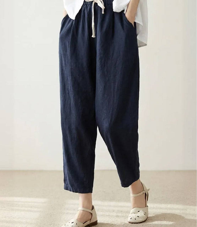 Navy linen drawstring pants with white oversized shirt, full outfit