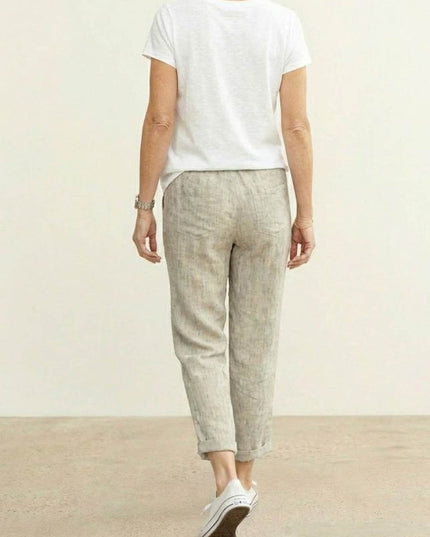 Back view of beige casual linen pants with elastic waistband
