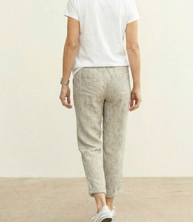 Back view of beige casual linen pants with elastic waistband
