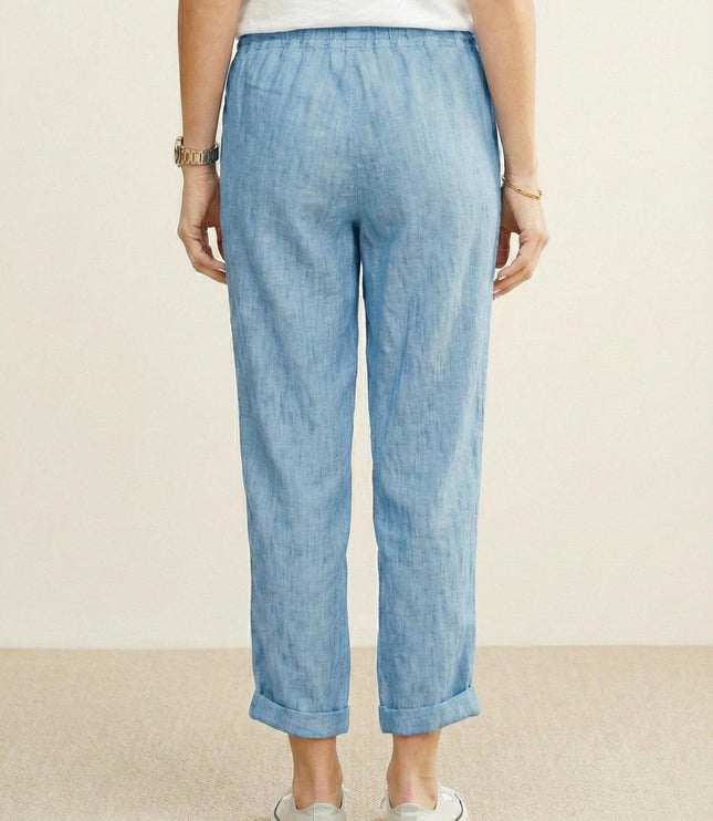 Back view of light blue linen casual pants with rolled cuffs