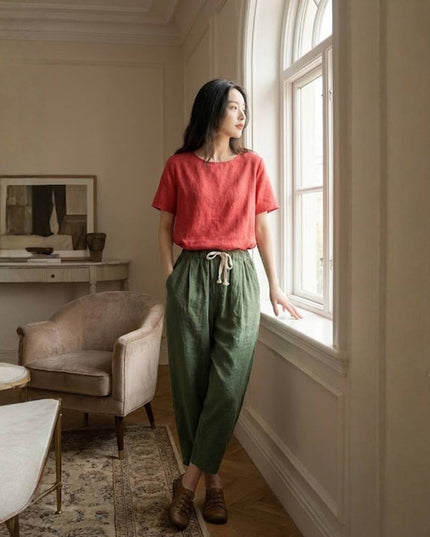 Sage green linen summer pants with cream drawstring and full length