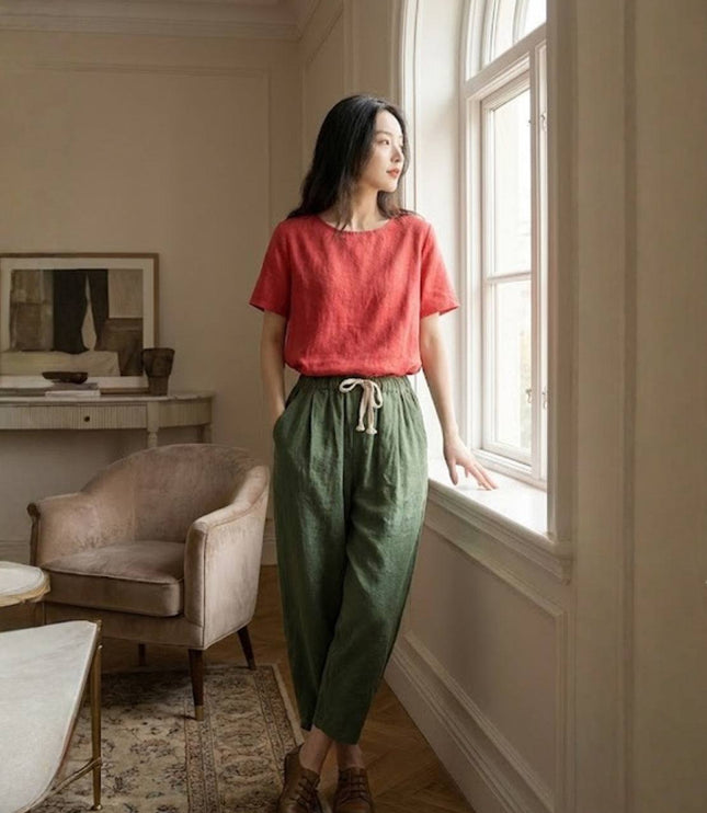 Sage green linen summer pants with cream drawstring and full length