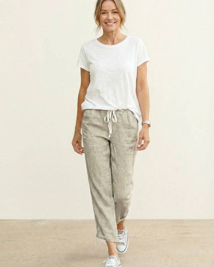 Front full-length view of beige summer linen drawstring pants