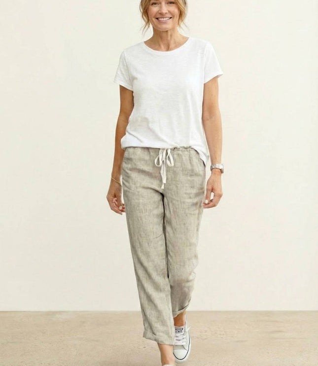 Front full-length view of beige summer linen drawstring pants