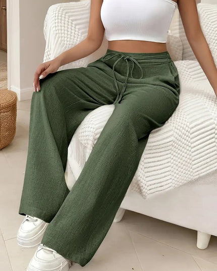 Dark green women's linen wide leg pants with high waist, drawstring front, and casual fit
