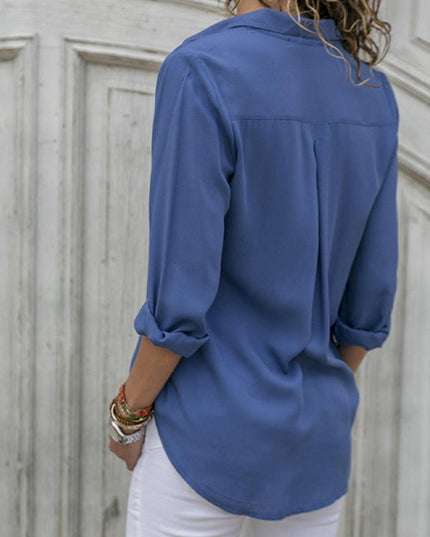 Navy blue button down collared blouse back view with rolled sleeves