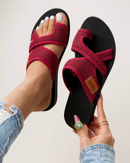 Burgundy mesh criss cross slides with cushioned sole and brown accent patch