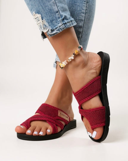Burgundy textured criss cross cushioned slip on slides with black sole
