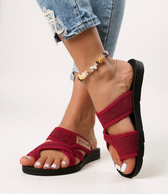 Burgundy textured criss cross cushioned slip on slides with black sole