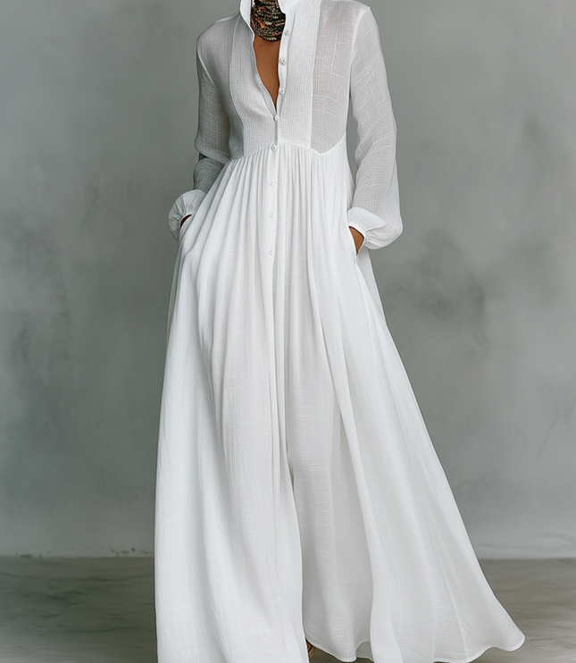White long sleeve stand collar maxi dress with button front and pleated skirt