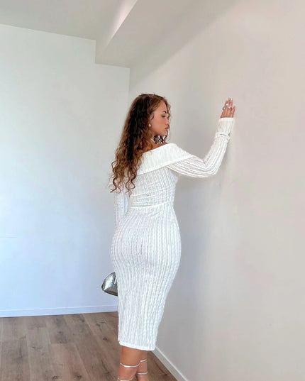 Side view of white off shoulder midi dress with fitted ribbed fabric and long sleeves