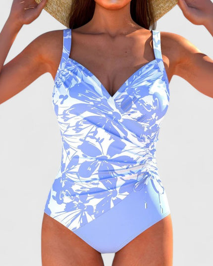 Blue and white floral print wrap bodice one-piece swimsuit front view