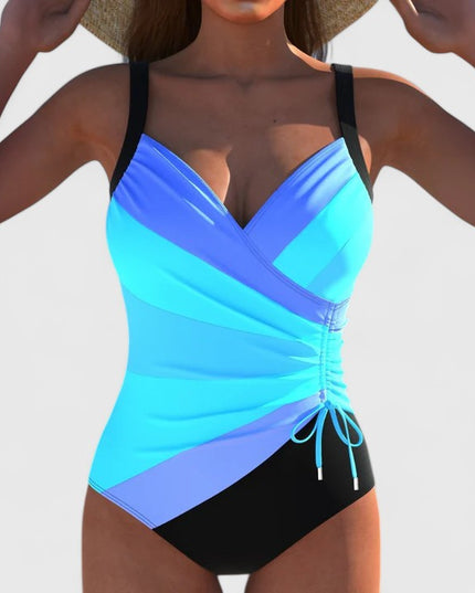 Turquoise and purple ombre wrap bodice one-piece swimsuit with black bottom