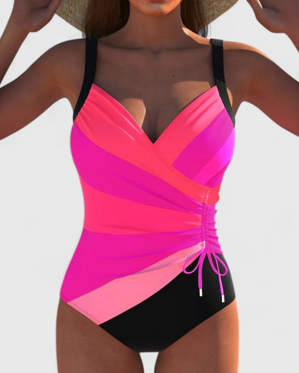 pink and coral wrap bodice one-piece swimsuit with black bottom