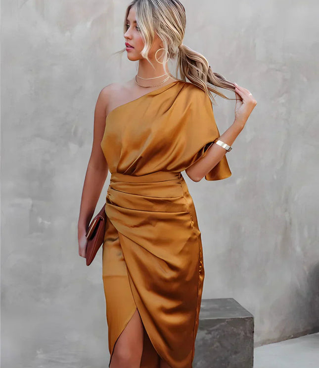 Stylish golden brown one shoulder draped satin midi dress with a side slit and a matching clutch
