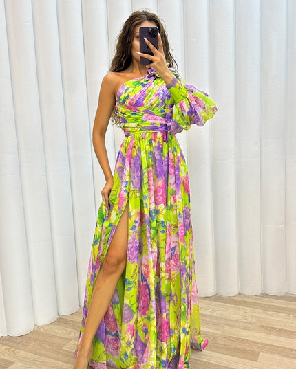 One shoulder puff sleeve maxi dress with vibrant floral print and high slit