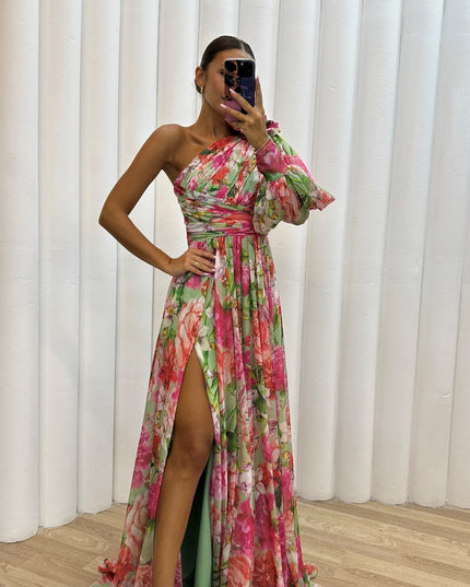 Floral maxi dress with asymmetric one shoulder and voluminous puff sleeve detail