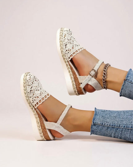 Two cream crochet platform sandals with buckle straps and braided ankle accents