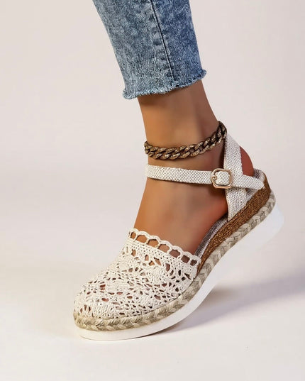 Cream crochet platform sandal with buckle ankle strap and metallic chain accent