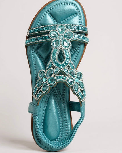 Teal metallic flat sandal with turquoise and crystal rhinestone embellishments