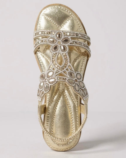 Gold and cream crystal flat sandals with ornate rhinestone patterns, pair view