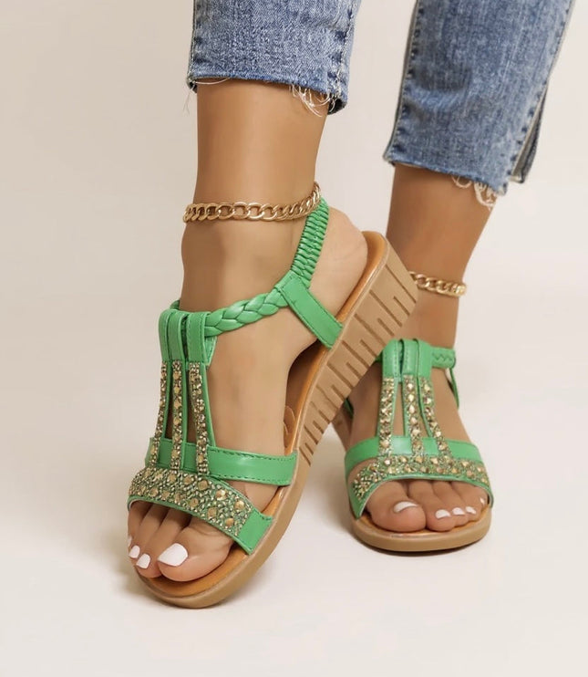 Green embellished wedge platform sandals with rhinestone accents and braided t-strap design