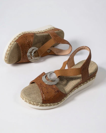 Pair of tan and cream platform espadrille sandals flat lay view
