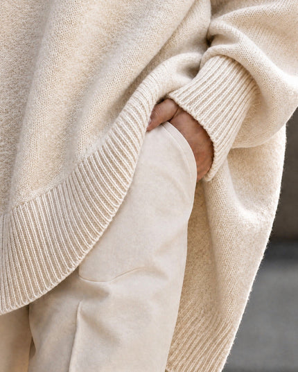 Women's Oversized Crew Neck Jumper with Asymmetric Hem