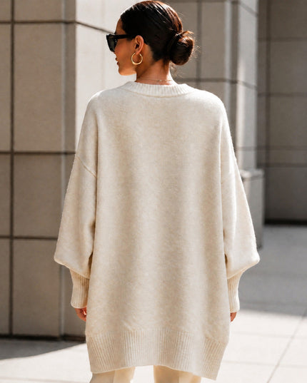 Women's Oversized Crew Neck Jumper with Asymmetric Hem
