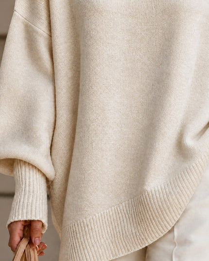 Women's Oversized Crew Neck Jumper with Asymmetric Hem