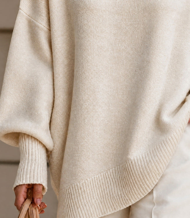 Women's Oversized Crew Neck Jumper with Asymmetric Hem