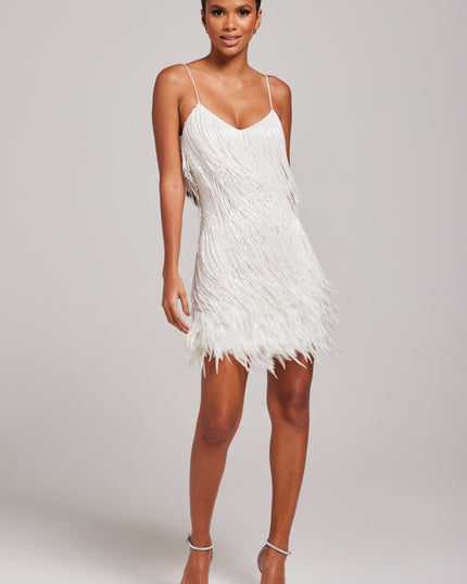 White fringe party dress with beaded bodice and feather hem detail