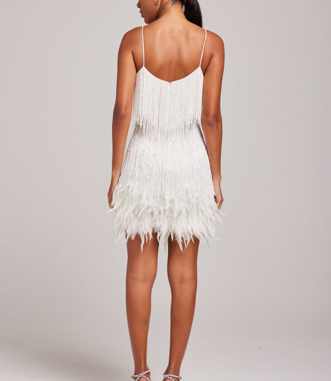 Back view of white beaded fringe mini dress with feathered hem